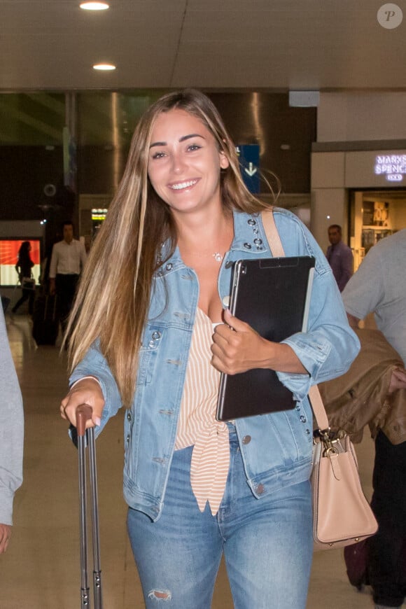 Charlotte Pirroni (compagne de Florian Thauvin) à l'aéroport de Paris-Charles-de-Gaulle après le dernier match de poule de l'équipe de France lors de la coupe du monde en Russie, à Roissy-en-France, France, le 27 juin 2018.