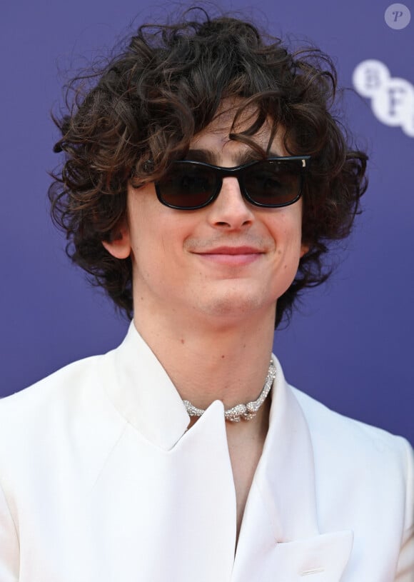 Il a ensuite révélé son identité, provoquant une vive réaction et des cris d'enthousiasme. La police a dû intervenir pour encadrer l'événement
Timothée Chalamet au photocall du film "Bones and All" lors du festival du film de Londres (BFI) le 8 octobre 2022.