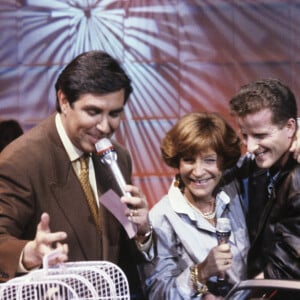 Archive - En France, à Paris, Jean-Pierre Foucault, Maria Pacôme et son fils François le 10 février 1990.