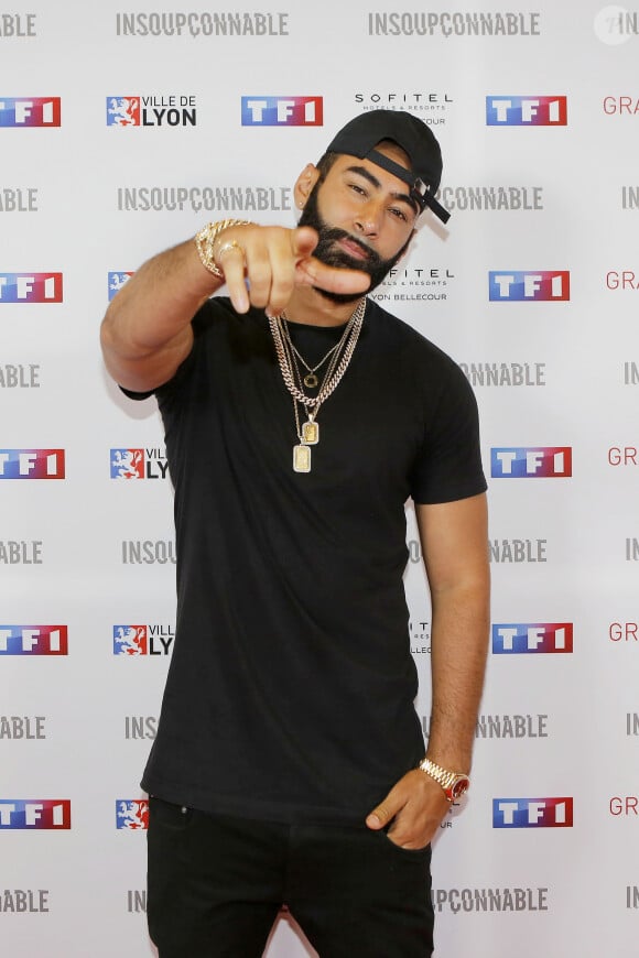 La Fouine a par exemple confié sa fierté de voir l'impact du mari de Mélissa Theuriau sur la jeunesse issue des quartiers populaires. 
La Fouine (Laouni Mouhid) - Avant-première de la série "Insoupçonnable" au Pathé-Bellecour à Lyon. Le 7 juin 2018