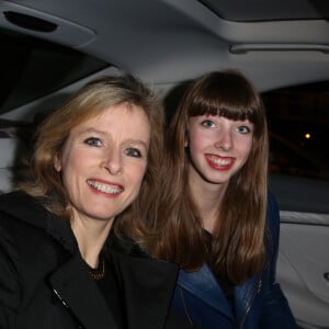 Karin Viard et sa fille Simone Machuel - Arrivées des people au défilé de mode, collection prêt-à-porter automne-hiver 2014/2015 "Paul & Joe" à Paris. Le 4 mars 2014 