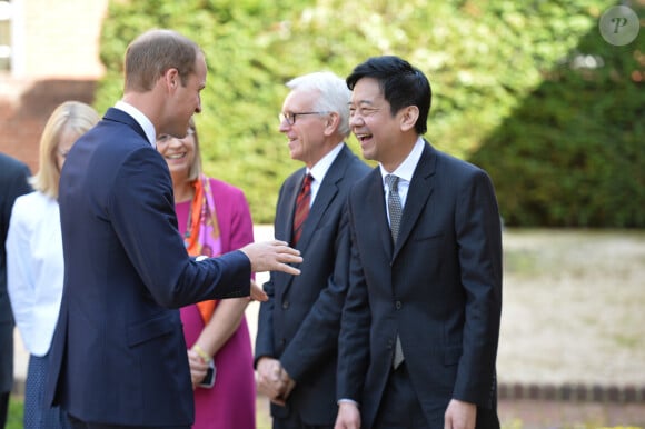 Le prince William, duc de Cambridge, visite l'université d'Oxford et rencontre Mr Dickson Poon. Le 8 septembre 2014 