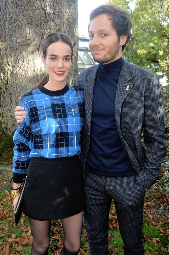 Vianney Bureau (Vianney), sa compagne Catherine Robert - People au défilé Lacoste Collection Prêt-à-Porter Printemps/Eté 2020 lors de la Fashion Week de Paris, le 1er octobre 2019. © Veeren Ramsamy-Christophe Clovis/Bestimage