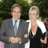 Nonce Paolini et sa femme Catherine Falgayrac à la soirée Lancel organisée pour le lancement du BB Bag, le 14 juin 2010