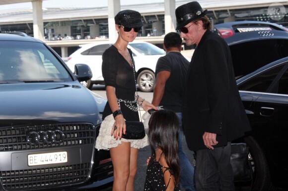 Johnny et Laeticia Hallyday rentrent à Los Angeles. 27 juin 2010