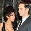 Amy Winehouse et son boyfriend Reg Traviss à l'inauguration du restaurant Shaka Zulu, à Londres, le 4 août 2010
