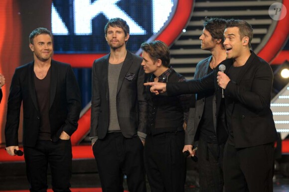 Les Take That au grand compet sur le plateau de X Factor Italie, à Milan, le 23 novembre 2010