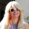Paris Hilton ne cache plus ses rondeurs... Ces clichés l'illustrant avec ses chihuahuas à Los Angeles, le dimanche 23 janvier, font quasiment office de preuve.