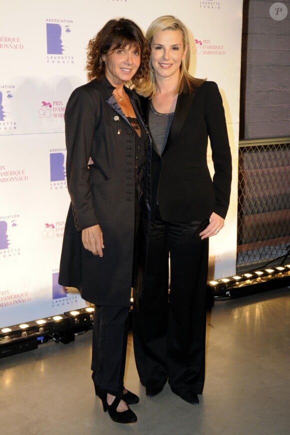 Laurence Ferrari et Stéphanie Fugain assistent au dîner de gala du 90e Prix d'Amérique, au Cent-Quatre (Paris XIe), samedi 29 janvier 2011.