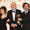 Helena Bonham Carter, Christopher Lee et Tim Burton lors des BAFTA awards à Londres le 13 février 2011