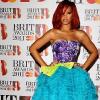 Rihanna dans une robe Dior lors du photocall des Brit Awards le 15 février 2011 à Londres
