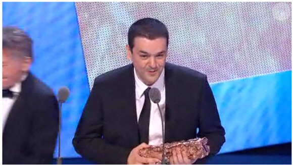 Yoann Sfar, réalisateur du film Gainsbourg vie héroïque reçoit le César du Meilleur premier film, lors de la 36e nuit des César, vendredi 25 février.