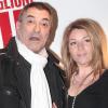 Jean-Marie Bigard et sa compagne Lola, à Paris, lors de la projection du film La proie. 13 avril 2011