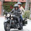 Johnny Hallyday et une amie à Santa Monica le 17 avril 2011