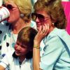 Dans n'importe qu'elle situation, Lady Diana faisait très attention à son look. Ici avec la prince William lors d'un match de polo à Windsor.