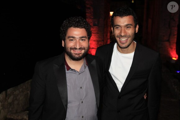 Mouloud Achour et Mustapha el Atrassi lors de la soirée Canal + à Cannes le 13 mai 2011