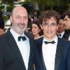 Cédric Klapisch et Albert Dupontel lors de la projection de "Belmondo, ititnéraire...", le 17 mai 2011, à Cannes.