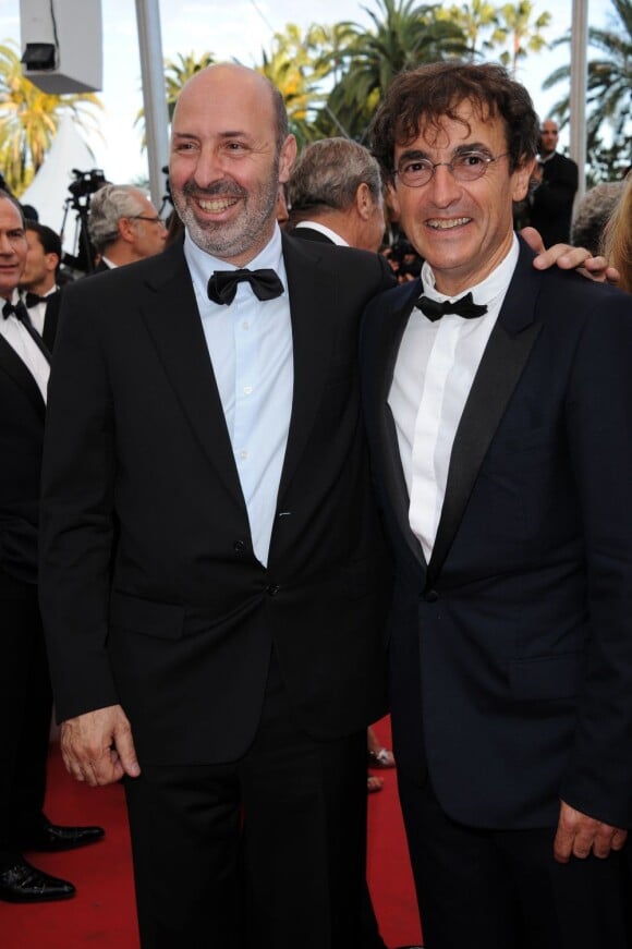 Cédric Klapisch et Albert Dupontel lors de la projection du documentaire "Belmondo, itinéraire...", le 17 mai 2011, dans le cadre du 64e festival de Cannes.
