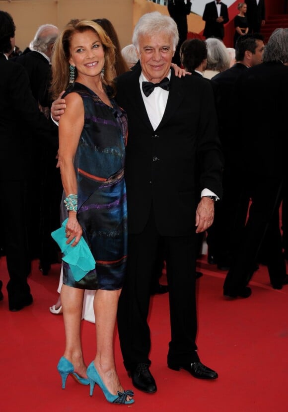Nicole Calfan et Guy Bedos lors de la projection du documentaire "Belmondo, itinéraire...", le 17 mai 2011, dans le cadre du 64e festival de Cannes.
