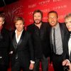 Jean-Roch pose aux côtés du groupe Duran Duran, au VIP Room de Cannes, lors du Festival de Cannes 2011.