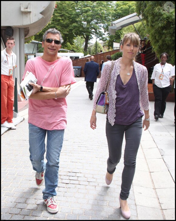 Nagui et son épouse Mélanie Page au tournoi de Roland-Garros, le lundi 30 mai 2011.