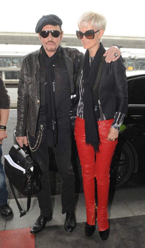 Johnny Hallyday et Laeticia, à Paris, le 31 mars 2011.