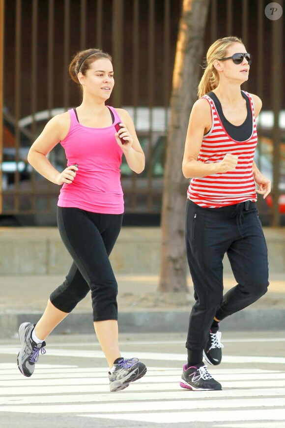 Heidi Klum au côté de sa coach ne manque jamais son jogging du matin. Ici, dans les rues de New York, le 21 juin 2011