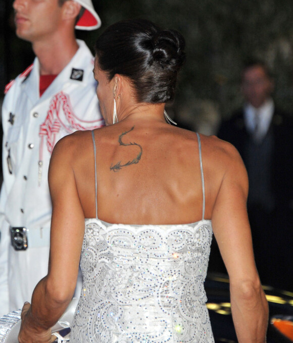 Stéphanie de Monaco de dos avec un énorme tatouage et dans une robe signée Jicky lors du dîner organisé pour le mariage du Prince Albert avec Charlene Wittstock. Monaco, le 2 juillet 2011