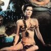 Carrie Fischer, alias Princesse Leïa, dns Le Retour du Jedi avec son célèbre bikini doré