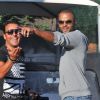 Tony Parker en vacances à Saint-Tropez rencontre son ami Jean-Roch, le 1er août 2011