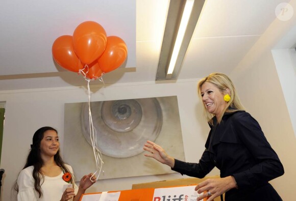 La princesse Maxima des Pays-Bas, princesse de la maison Oranje, avait misé gros sur le jaune pour l'inauguration d'un centre d'accueil pour femmes battues à Almaar, mardi 30 août 2011.