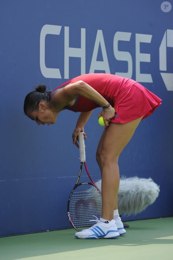 L'Italienne Flavia Pennetta a elle aussi subit de plein fouet la chaleur écrasante de l'US Open, victime de spasmes durant son match face à la Chinoise Shuai Peng.