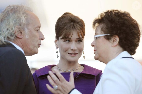 Didier Barbelivien, Carla Bruni-Sarkozy et Christine Boutin, à Paris, le 14 juillet 2008.