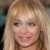 Lumineuse, Nicole Richie s'est distinguée dans la pléiade de stars qui assiataient au défilé Louis Vuitton printemps-été 2012. Paris, le 5 octobre 2011.