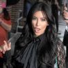 L'accro au shopping Kim Kardashian assemble sa petite robe noire à ses chaussures en reptile Christian Louboutin. New York, le 6 septembre 2011.
