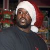 Dès que les fêtes de Noël approche, Shaquille O'Neal ne quitte plus son bonnet de Père Noël, comme ce 14 novembre 2011 à New York