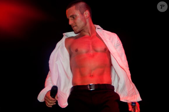 Allan Theo, torse nu, en octobre 2011 à Nice