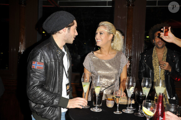 Katrina Patchett et Valentin D'Hoore (Koh Lanta) lors du 20e anniversaire du Hard Rock Cafe à Paris le 24 novembre 2011