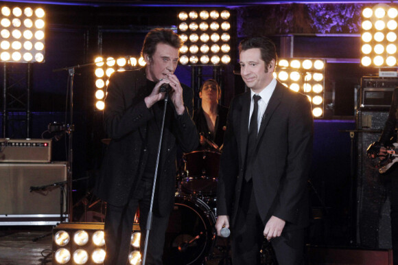 Laurent Gerra et Johnny Hallyday lors de l'enregistrement de l'émission Laurent Gerra ne s'interdit rien, samedi 10 décembre 2011 sur TF1