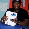 50 Cent lance sa gamme de casques audio sans fil Street by 50 et Sync by 50, à New York le 15 décembre 2011