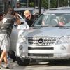 Boris Becker assailli par une horde de photographes le 20 décembre 2011 à Miami