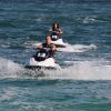 Tom Felton et Jade en vacances à Miami, le 1er janvier 2012. Une balade en jet ski...