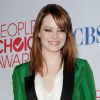 Emma Stone signe un des meilleurs looks de la soirée grâce à une tenue Gucci. Los Angeles, le 11 janvier 2012.