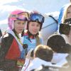 Des copines sur les plus hautes marches du podium ! Clara Direz (dossard bleu) et Estelle Alphand (casque rose) ont signé un doublé or-argent dans l'épreuve de slalom géant des Jeux Olympiques d'Hiver  de la Jeunesse d'Innsbruck, le 18 janvier 2012.