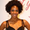 Une ravissante jeune femme expose la collection de Spanx la marque de lingerie qui fait fureur auprès des stars américaines s'installe au Salon International de la Lingerie le 22 janvier 2012