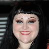 La chanteuse et leader du groupe Gossip, Beth Ditto, assistait au défilé  haute couture de Maxime Simoens à Paris, le 25 janvier 2012.