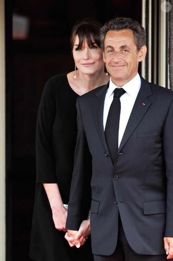 Carla Bruni (enceinte) et son époux Nicolas Sarkozy à Deauville en 2011.