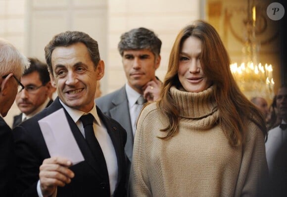 Carla Bruni et son époux Nicolas Sarkozy lors du Noël de L'Elysée, fin 2011.