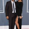 John Legend et sa fiancée Chrissy Teigen sur le tapis rouge de la cérémonie des 54e Grammy Awards au Staples Center de Los Angeles le 12 février 2012. Les stars étaient nombreuses à être venues accompagnées pour la grand-messe des récompenses musicales américaines.