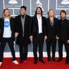 Les Foo Fighters sur le tapis rouge de la cérémonie des 54e Grammy Awards au Staples Center de Los Angeles le 12 février 2012. Les stars étaient nombreuses à être venues accompagnées pour la grand-messe des récompenses musicales américaines.